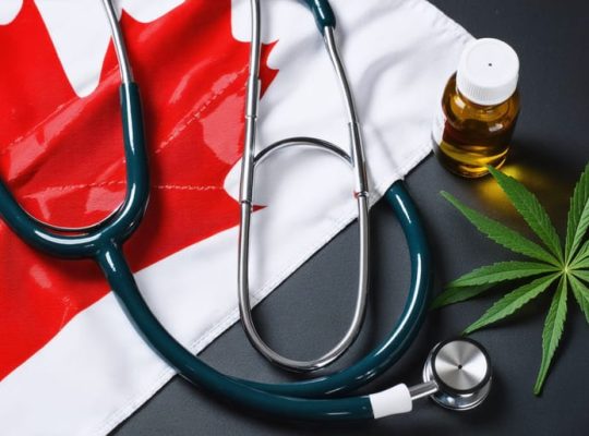 A stethoscope lying over the Canadian flag, with CBD oil bottles in the foreground, illustrating the intersection of medicine, Canadian regulations, and CBD treatments for healthcare providers.
